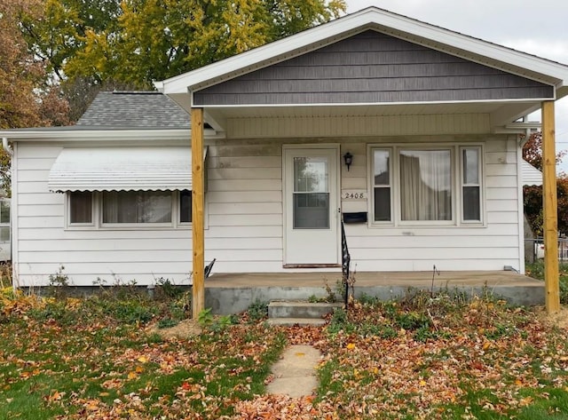 bungalow-style home with a porch