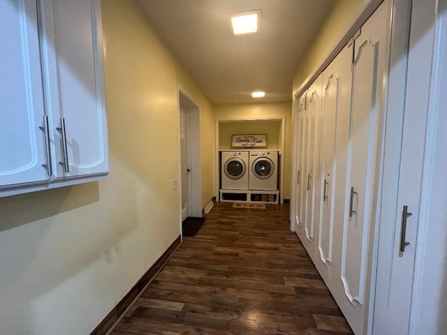 hallway featuring washer and dryer and dark hardwood / wood-style floors