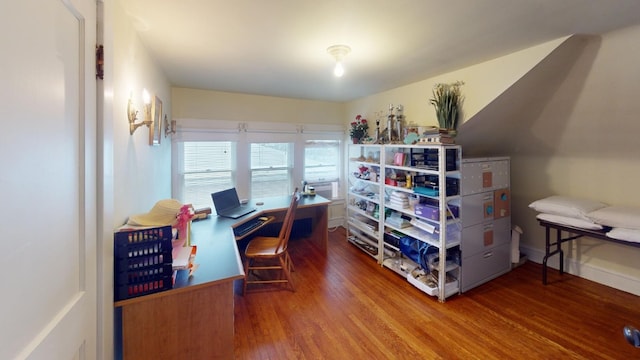 home office with hardwood / wood-style floors