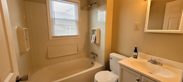 bathroom with  shower combination, vanity, and toilet