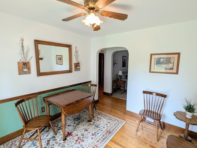 933 E 31st St, Erie, PA 16504 - dining room featuring arched walkways, light wood-type flooring, and ceiling fan