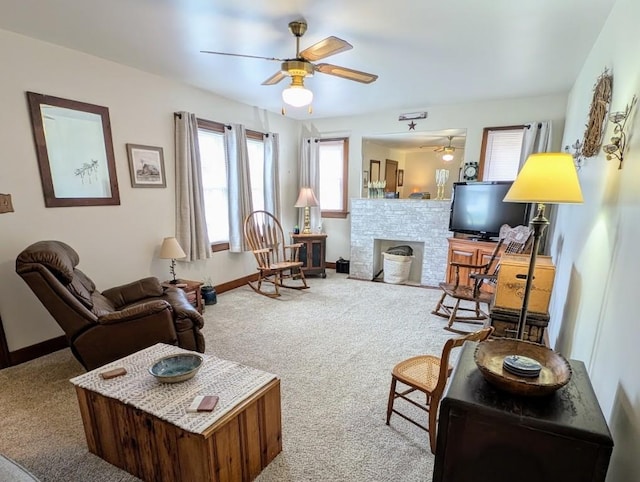 933 E 31st St, Erie, PA 16504 - carpeted living room featuring ceiling fan and a fireplace with flush hearth