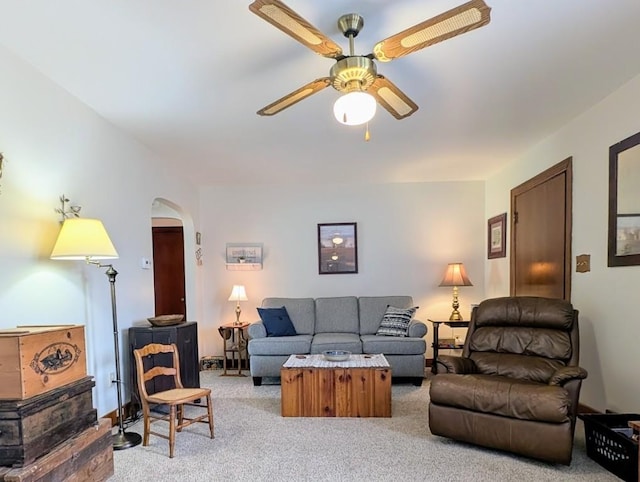 933 E 31st St, Erie, PA 16504 - living room featuring light colored carpet, arched walkways, and ceiling fan