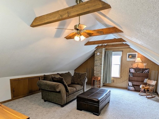 933 E 31st St, Erie, PA 16504 - carpeted living area with a textured ceiling, wooden walls, and ceiling fan