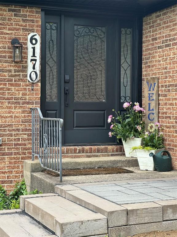 6170 Mistletoe Ave, Fairview, PA 16415 - entrance to property with brick siding