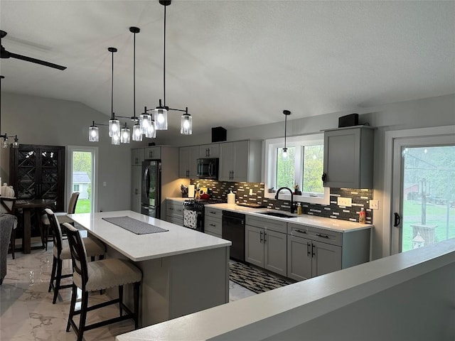 6170 Mistletoe Ave, Fairview, PA 16415 - kitchen with black appliances, a sink, gray cabinets, tasteful backsplash, and light marble finish floors