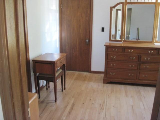 bedroom featuring light wood-type flooring