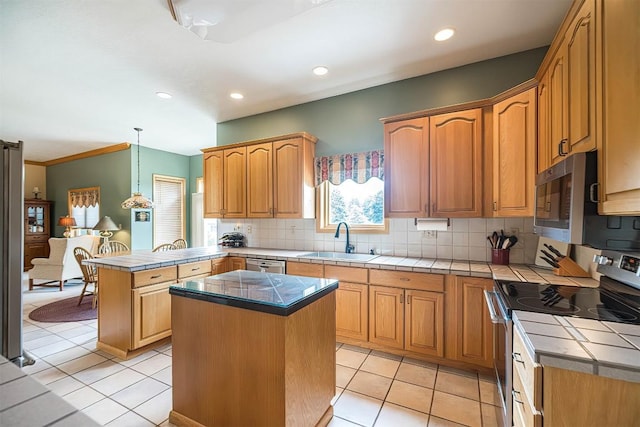 4031 Zimmerly Rd, Erie, PA 16506 - kitchen featuring stainless steel appliances, a peninsula, tasteful backsplash, tile countertops, and recessed lighting
