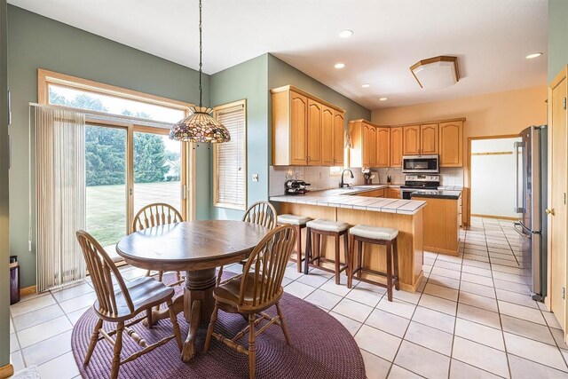 4031 Zimmerly Rd, Erie, PA 16506 - dining area featuring light tile patterned flooring and recessed lighting