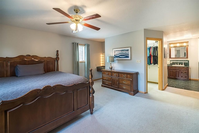 4031 Zimmerly Rd, Erie, PA 16506 - carpeted bedroom with a walk in closet, a ceiling fan, a closet, and ensuite bathroom