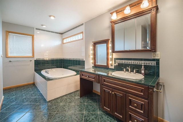 4031 Zimmerly Rd, Erie, PA 16506 - full bath with a garden tub, vanity, tile patterned flooring, and backsplash