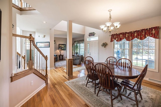 6018 Pebble Creek Dr, Fairview, PA 16415 - dining room with baseboards, a chandelier, light wood finished floors, stairway, and recessed lighting