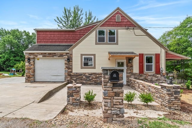 20527 Baird Rd, Meadville, PA 16335 - view of front of home featuring stone siding, driveway, an attached garage, and a shingled roof