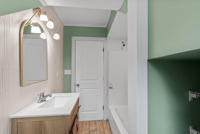 20527 Baird Rd, Meadville, PA 16335 - bathroom featuring vanity, wood finished floors, a tub to relax in, and a shower