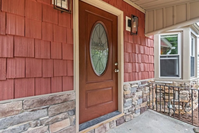20527 Baird Rd, Meadville, PA 16335 - doorway to property featuring stone siding and a porch