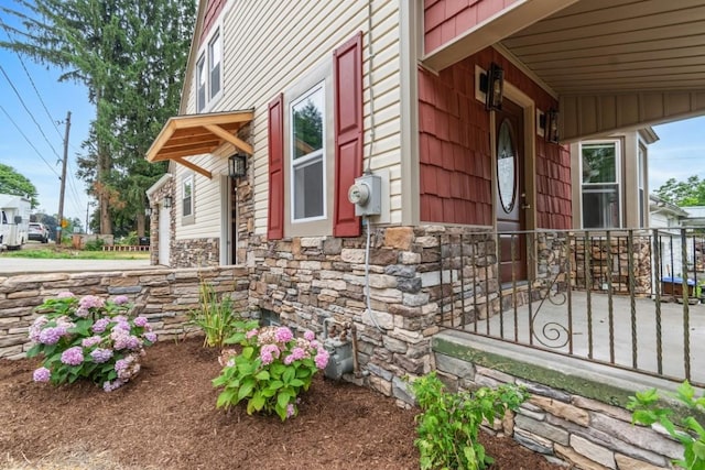 20527 Baird Rd, Meadville, PA 16335 - view of side of home featuring stone siding and covered porch