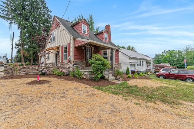 20527 Baird Rd, Meadville, PA 16335 - view of front facade featuring a porch and stone siding