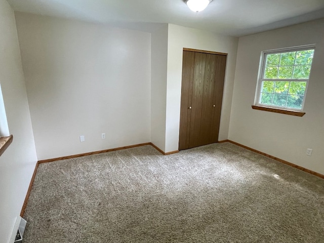 1742 W Gore Rd, Millcreek, PA 16509 - unfurnished bedroom featuring a closet and carpet