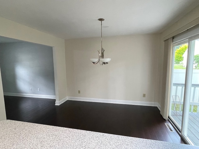 1742 W Gore Rd, Millcreek, PA 16509 - unfurnished dining area with a chandelier, dark wood-style floors, and plenty of natural light