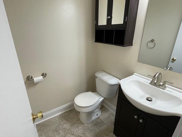 1742 W Gore Rd, Millcreek, PA 16509 - bathroom featuring toilet and vanity