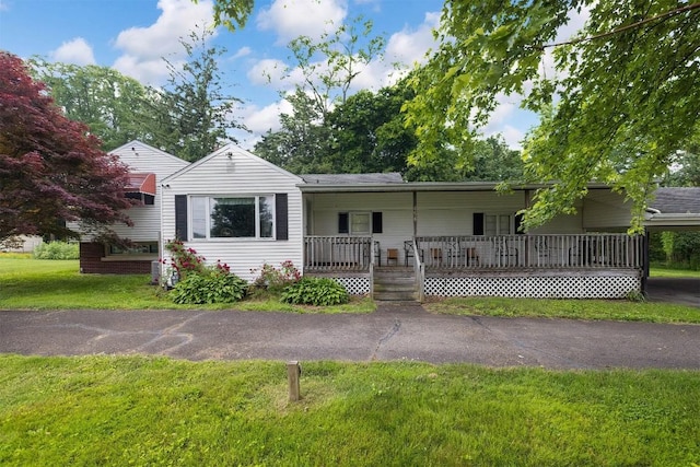 454 Orchard Beach Rd, North East, PA 16428 - ranch-style home with a porch and a front lawn