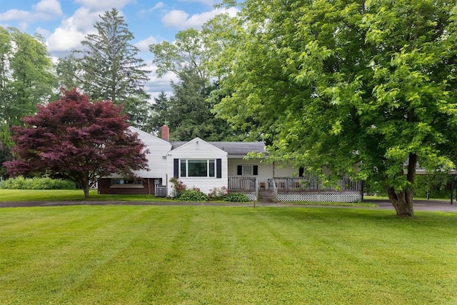 454 Orchard Beach Rd, North East, PA 16428 - view of front of property featuring a front lawn and a chimney