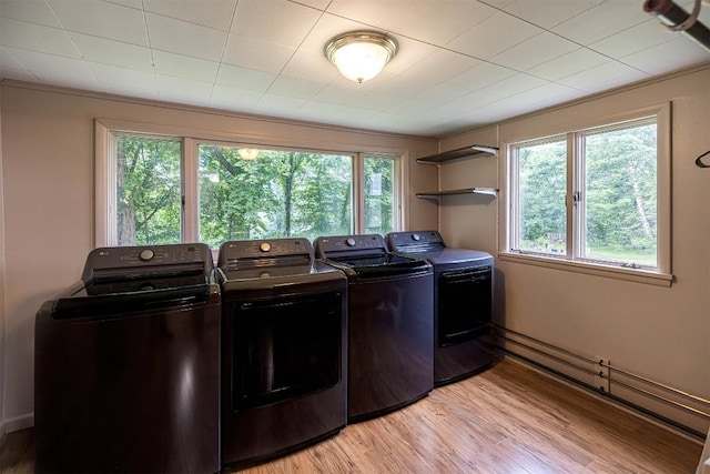 454 Orchard Beach Rd, North East, PA 16428 - washroom featuring washing machine and dryer, healthy amount of natural light, and light wood-style floors