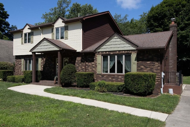 view of front of property with a front lawn