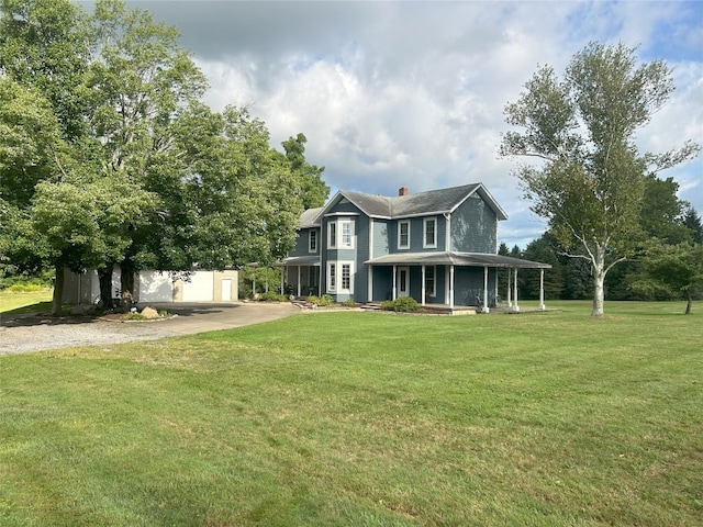 view of front of house featuring a front lawn and covered porch