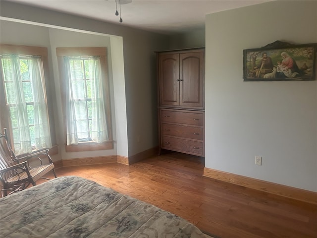 unfurnished bedroom with light hardwood / wood-style flooring