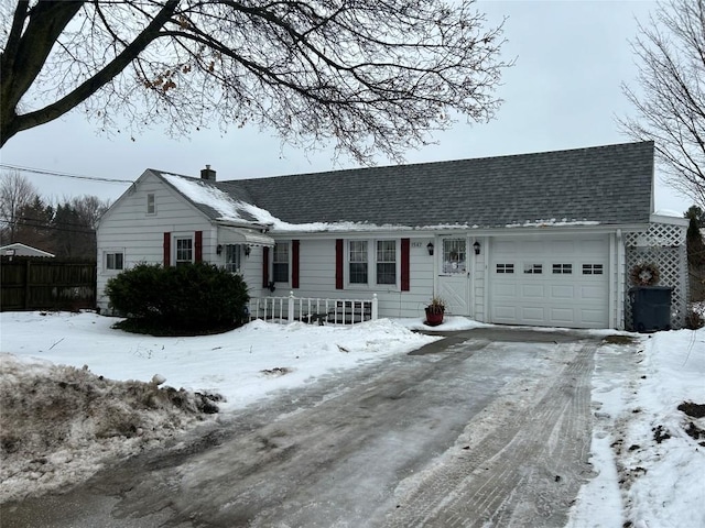 view of front of property with a garage