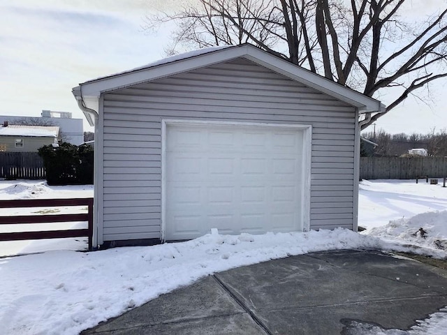 view of snow covered garage