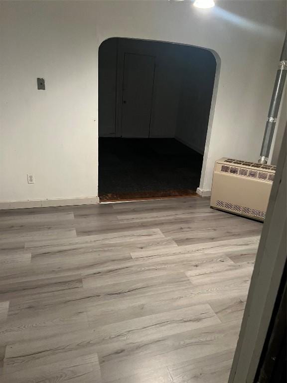 spare room with light hardwood / wood-style floors