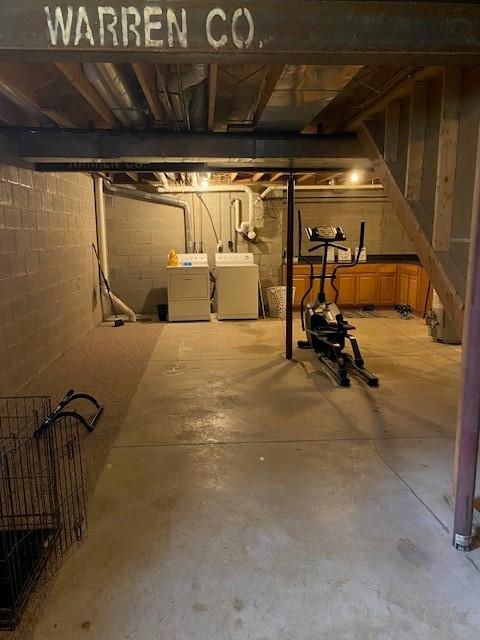 2156 Depot St, Waterford, PA 16441 - unfinished basement with washing machine and dryer and concrete block wall