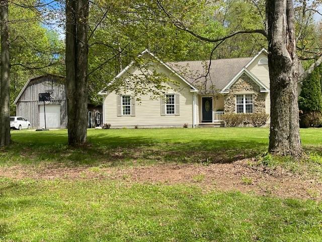 2156 Depot St, Waterford, PA 16441 - ranch-style house with an outbuilding and a front lawn