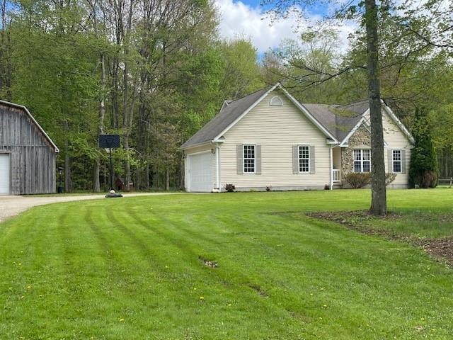 2156 Depot St, Waterford, PA 16441 - back of property featuring a yard, a garage, and driveway