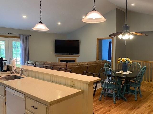 2156 Depot St, Waterford, PA 16441 - kitchen with dishwasher, a sink, lofted ceiling, a ceiling fan, and light countertops