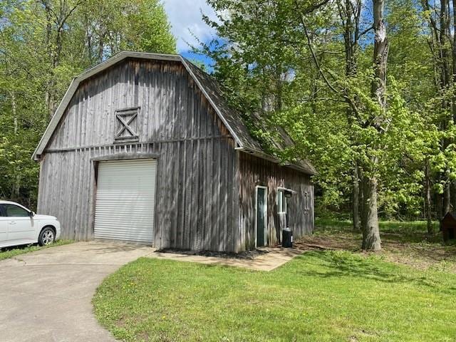2156 Depot St, Waterford, PA 16441 - view of barn featuring concrete driveway and a lawn