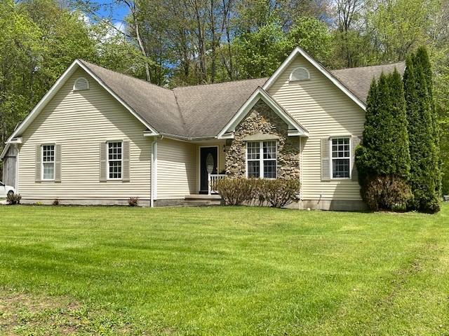 2156 Depot St, Waterford, PA 16441 - ranch-style house with a front yard, a shingled roof, and stone siding