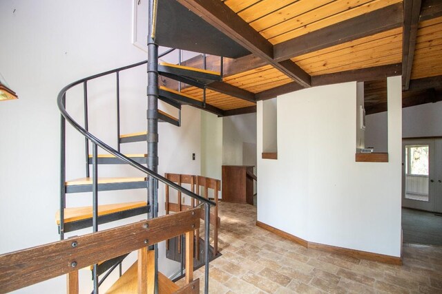 5130 W Stancliff Rd, Mckean, PA 16426 - staircase with beamed ceiling, stone finish floor, wood ceiling, and baseboards