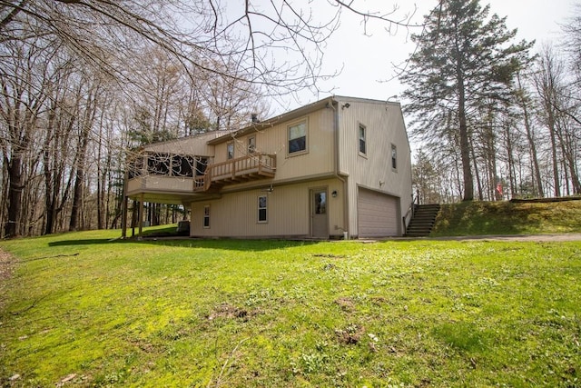 5130 W Stancliff Rd, Mckean, PA 16426 - back of house featuring a lawn, an attached garage, stairway, and a deck