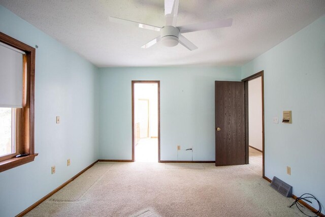 5130 W Stancliff Rd, Mckean, PA 16426 - empty room with baseboards, a ceiling fan, visible vents, and carpet