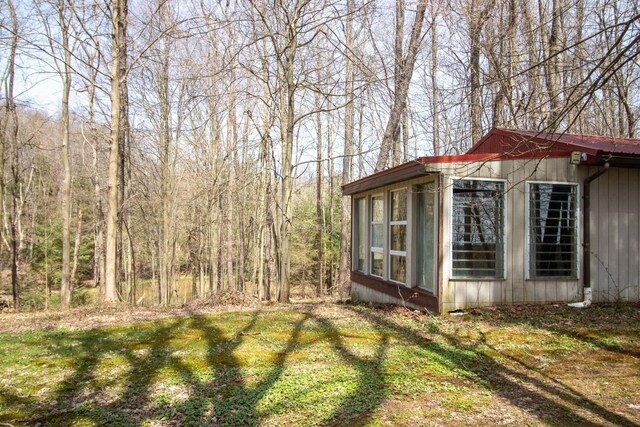 5130 W Stancliff Rd, Mckean, PA 16426 - view of yard with a sunroom and a view of trees
