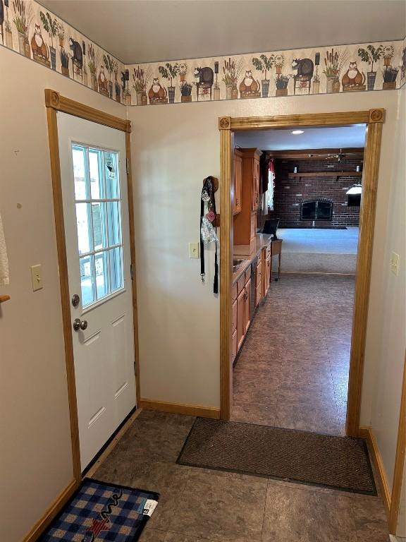 6848 6th Hwy, Linesville, PA 16424 - doorway to outside with a fireplace
