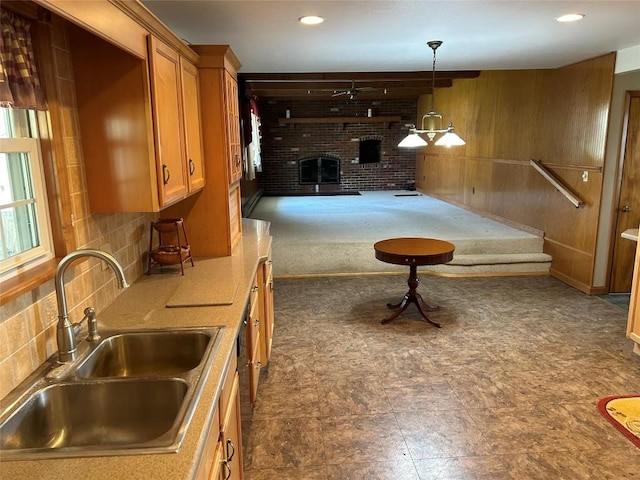 6848 6th Hwy, Linesville, PA 16424 - living room with wooden walls, a brick fireplace, and recessed lighting