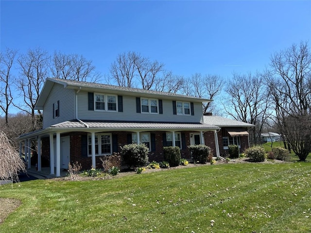 6848 6th Hwy, Linesville, PA 16424 - traditional-style house with covered porch, brick siding, and a front yard