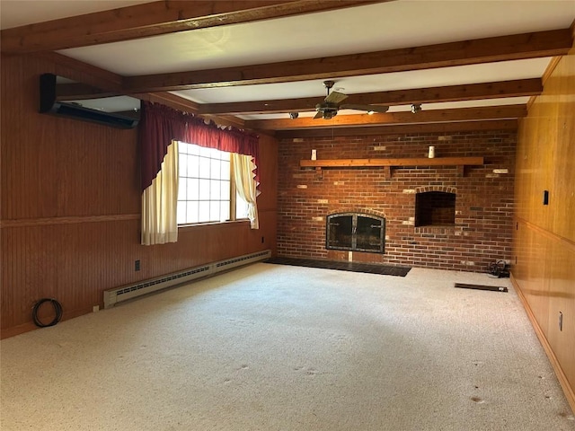 6848 6th Hwy, Linesville, PA 16424 - unfurnished living room with wood walls, a fireplace, a ceiling fan, carpet floors, and a baseboard radiator
