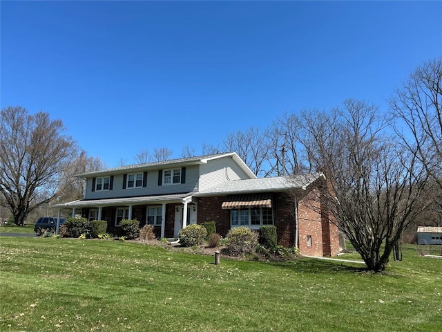 6848 6th Hwy, Linesville, PA 16424 - traditional-style home featuring brick siding and a front yard