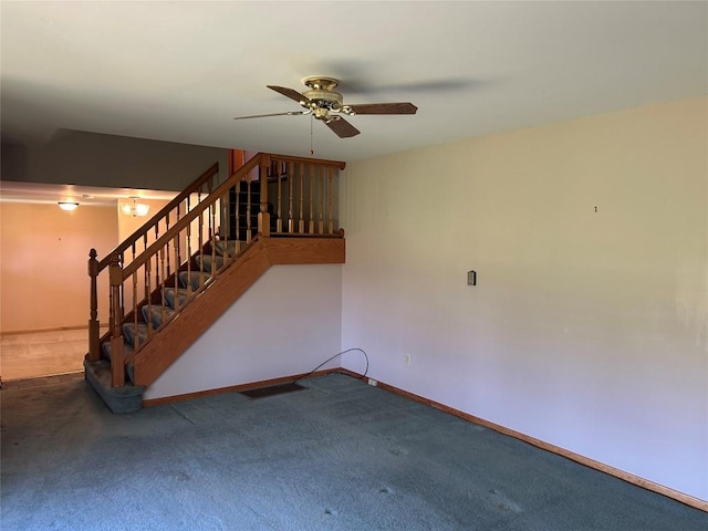 6848 6th Hwy, Linesville, PA 16424 - unfurnished living room with stairway, carpet floors, a ceiling fan, and baseboards