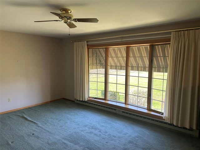 6848 6th Hwy, Linesville, PA 16424 - carpeted spare room with baseboard heating, baseboards, and a ceiling fan